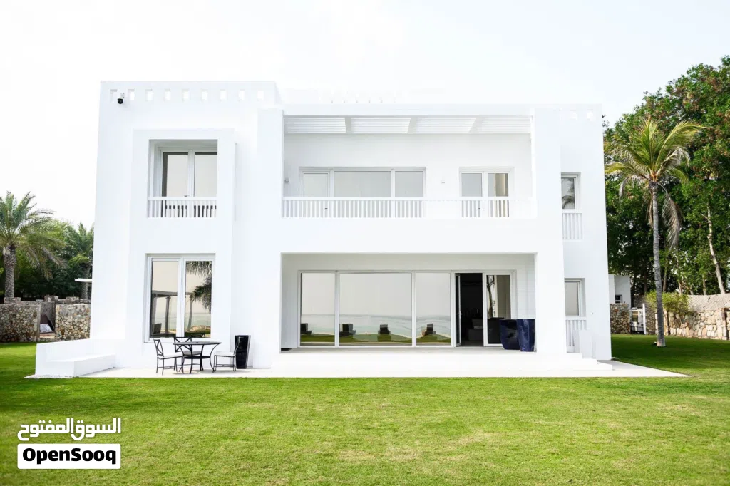 Luxurious 5BR beachfront Villa with private pool and Marina access available for Sale in Jebel Sifah